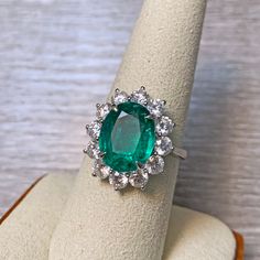 Absolutely stunning Zambian emerald 18k white gold ring! The emerald is from Zambia, beautiful rich green color and good clarity for its size. There are 1.77 carats of sparkly white diamonds adorning the ring! This ring comes with one certification: Gemological Institute of America (GIA) Ring Size: 7 Total Weight: 6.21 grams Precious Metal: 18k gold Precious stones: -Emerald Center Stone: 4.26 carats, 12.1mm x 9.5mm -White Diamonds: 1.77 carats Hallmark: 750 CS 4.26 D1.77 21 Grams, Solid Gold Ring, Zambian Emerald, Rich Green, Solid Gold Rings, Precious Metal, Emerald Diamond, Ring Ring, White Diamonds