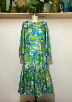 "Vintage 60s Italian Eleonora Garnett floral Paisley silk dress. Great colors/shape. Nice vintage condition with wear thats consistent with age. Please see photos for reference.  14\" shoulder  18.5\" pit to pit  16\" waist  23\" sweep @ seam 65\" sweep 11\" sleeve opening flat  18\" sleeve  42\" length" 1970s Green Floral Print Dress, 1970s Style Green Floral Print Dress, Vintage Silk Dress With Floral Print, Vintage Paisley Print Spring Dresses, Vintage Paisley Print Dresses For Spring, Vintage Multicolor Paisley Print Dresses, Uniform Dress, Color Shapes, Vintage 60s