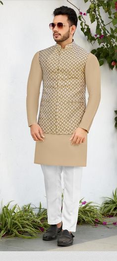 Details : Color -cream- colour kurta, Cream flowers jacket  Any Color you may ask for...(we can make it )  Fabric -Imported Fabric  Work Details : quilted work Bottom Details Color - White -- Churidar Package Include : Top , Bottom All others accessories are for photography purpose only . Just the Top and bottom available . Color variation may be there slightly , due to computer resolution and camera . Festive Beige Sets With Traditional Drape, Festive Beige Straight Kurta Set, Cream Bandhgala With Long Sleeves For Diwali, Cream Long Sleeve Bandhgala For Diwali, Festive Beige Outerwear For Wedding, Beige Outerwear For Wedding, Semi-stitched Beige Kurta With Traditional Drape, Beige Straight Kurta For Eid, Beige Semi-stitched Kurta With Traditional Drape