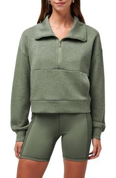 A supersoft knit defines this sweatshirt cut for a fit that's slim but not too snug and perfect for your weekends whether busy or lazy. 20" length (size Medium) Half-zip closure Stand collar Kangaroo pocket 85% rayon, 9% polyester, 6% elastane Machine wash, tumble dry Imported Athleisure Funnel Neck Sweater, Long Sleeve Fleece Workout Tops, Sporty Fleece Tops For Layering, Fall Sportswear Funnel Neck Tops, Athleisure Funnel Neck Sweatshirt For Layering, Fall Activewear With Ribbed Waistband And Cozy Fit, Stretch Fleece Tops For Fall, Fall Fleece Tops With Ribbed Waistband, Fall Sports Half-zip Top