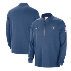 Highlight your unwavering fandom even when the temperature drops by grabbing this Minnesota Timberwolves Authentic half-zip jacket from Nike. It features a simple, yet bold Minnesota Timberwolves logo on the left chest. The feel of this fabric and Dri-FIT moisture wicking technology will ensure that whenever you wear it, you'll stay comfortable. Embroidered fabric applique Lightweight jacket suitable for moderate temperatures Material: 100% Polyester Imported Machine wash, tumble dry low Brand: Winter Cotton Outerwear For Fan Merchandise, Nike Long Sleeve Fleece Jacket For Outdoor Activities, Nike Winter Half-zip Outerwear, Nike Half-zip Winter Outerwear, Nike Cotton Long Sleeve Track Jacket, Nike Long Sleeve Fleece Jacket For Outdoor, Nike Outdoor Long Sleeve Fleece Jacket, Blue Half-zip Activewear For Sports, Blue Sports Activewear Half-zip