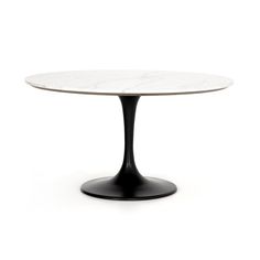 an oval marble table with black base