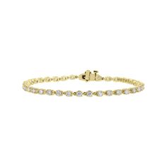 Elevate your wrist game with the Rolo Cable Link Tennis Bracelet, now available at Steven Singer Jewelers. This stunning bracelet is crafted from 14 karat gold and features a cable link style design that is adorned with a total weight of 2 carats in well-matched round brilliant diamonds. The diamonds are expertly set to create a stunning and unique pattern that sparkles from every angle. The bracelet's intricate design is truly remarkable, with the diamonds set in a way that creates a breathtaki Fine Jewelry Tennis Bracelet With Solid Link Construction, Classic Tennis Bracelet For Anniversary, Wrist Game, Diamond Tennis Bracelet, Tennis Bracelet Diamond, Top Gifts, Brilliant Diamond, 2 Carat, Intricate Design