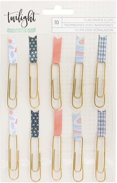 four pairs of paper clips with different patterns on them