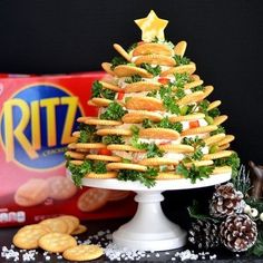 a christmas tree made out of crackers and vegetables