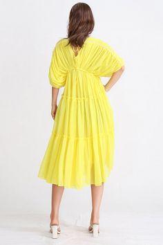 This midi dress is a perfect addition to your wardrobe. With its lightweight fabric, V neckline, dropped shoulders and wing sleeves, it provides the perfect balance of style and comfort. Enjoy an effortlessly chic look every day.Fabric: Cotton, Polyester Wing Sleeves, Yellow Midi Dress, Chic Look, V Neckline, Lightweight Fabric, Fabric Cotton, Boho Dress, Drop Shoulder, Favorite Color