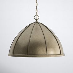 a light that is hanging from a ceiling fixture with a chain attached to the end