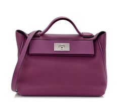 This is an authentic HERMES Togo Swift 24/24 29cm Anemone. This handbag is crafted of richly textured calfskin leather in purple. The bag features a reinforced leather top handle, an optional leather shoulder strap and palladium hardware including a padlock. The flap opens to a leather interior with a zipper pocket. This is an iconic and very sought after handbag, ideal for occasions that call for the luxury and style only from Hermes! Size Base length: 11.00 in Height: 8.50 in Width: 5.25 in Drop: 2.25 in Drop: 13.50 in Comes With Detachable Strap Anemone, Leather Interior, Leather Top, Top Handle, Zipper Pocket, Calf Skin, Bags Handbags, Swift, Shoulder Strap