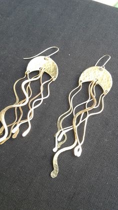 Earrings, Made to Order. Handmade Hammered Texture Brass Hanging Earrings with Sterling Silver Hooks. Made to Order in Copper, Brass or Sterling Silver. Every Option is with Sterling Silver Hooks *Earrings will vary slightly from the pictures as they are handmade.* Filigree Earrings, Hanging Earrings, Gold Brass, Jewelry Inspo, Brass Earrings, Hand Forged, Jellyfish, Boho Earrings, Silver Fashion