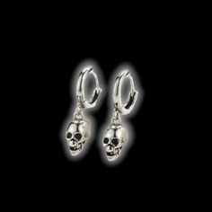 Silver plated hoop Star shaped stud Free delivery MSRP of 14.99 Euros Gold or sterling silver JAN drop earring jewelry Chain shop women Introducing the Skull Rocker Earrings These sterling silver earrings are designed to make a bold statement. Featuring a punk-inspired design with a star-shaped stud and a silver-plated hoop, these earrings are perfect for any rocker or fashionista. With their free delivery and affordable price of 14.99 Euros, these earrings make the perfect gift for yourself or Edgy Sterling Silver Jewelry In Silver, Silver Tarnish-resistant Piercings, Gothic Nickel-free Hoop Jewelry, Punk Style Cartilage Earrings As Gift, Punk Style Cartilage Earrings For Gift, Punk Cartilage Earrings As Gift, Nickel-free Metal Huggie Jewelry, Nickel Free Silver Huggie, Edgy Nickel-free Silver Jewelry