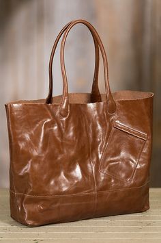 This fashioned leather bag is also the perfect travel bag for day trips or overnight getaways, or a spacious carry-on for air travel. Travel Free, Perfect Travel Bag, Air Travel, Leather Tote Bag, Day Trips, Travel Bag, Leather Tote, Carry On, Leather Bag