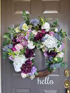 This beautiful large luxury artificial flower wreath is made with quality designer flowers.  Real touch white hydrangeas, hellebores, roses, peonies and a mix of flower buds, branches and greenery. This gorgeous wreath is perfect for spring and summer decor as well as a year round wreath.  The wreath measures at 25 inches in outer diameter tip to tip and 7 inches thick at the point where flowers are.  Suggested indoor or covered outdoor use. Purple Wreaths For Front Door, Purple And White Wreath, Purple Wreaths For Front Door Spring, Artificial Flower Wreath, Pink And Purple Wreath, Purple Wreaths For Front Door Summertime, Purple Floral Wreath, Purple Everyday Wreath, Summer Luxury