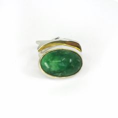 Size 7 Fine Jewelry Green Emerald Cabochon Ring, Green Cabochon Emerald Ring Fine Jewelry, Fine Jewelry Green Cabochon Emerald Ring, Elegant Green Cabochon Emerald Ring, Elegant Green Emerald Cabochon Ring, Unique Polished Emerald Ring For Formal Occasions, Luxury Green Emerald Ring With Polished Finish, Elegant Turquoise Gemstone Ring For Formal Occasions, Elegant Oval Chrysoprase Rings