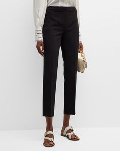 Kobi Halperin "Alexi" twill pants with pressed pleats Mid-rise sits high on the hip Flat front Side zip pockets Back welt pockets Cropped at the ankle Slim, straight legs Hook-and-bar/zip fly Polyester/spandex Dry clean Imported