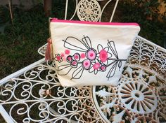 Fabric pouch bag hand embroidered with flowers, handmade, unique gift, one of a kind, carryall https://etsy.me/2UqtH02 #white #pink #zipperpouch #handmadepouch #cosmeticscase #carryallpouch #accessoriespouch #uniquegifts #whittepouchbag Embroidered Clutch Bag, Flowers Unique, Jute Tote Bags, Summer Tote Bags, Jute Totes, Fabric Pouch, Embroidered Clutch, Cotton Pouch, Handmade Tote