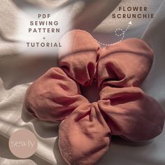 Product Description: Create your own beautiful flower-shaped scrunchie with this easy-to-use digital sewing pattern! Perfect for beginners, this pattern allows you to craft a stylish hair accessory that adds a unique touch to any outfit. Languages: - Polish - English What's Included: - Digital PDF Pattern for a flower scrunchie in one size. - A detailed list of all the materials and tools you'll need. - Step-by-step instructions designed for beginners, making the sewing process simple and enjoya Scrunchies Pattern Sewing, Hair Tie Pattern, Scrunchie Designs, Sewing Hair Accessories, Unique Scrunchies, Scrunchie Tutorial, Diy Hair Tie, Flower Scrunchie, Hair Ties Diy