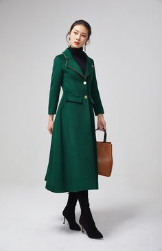 "This stunning dark green wool coat for womens is beautifully fitted and tailored for a classic, feminine design. There is a brooch decoration on lapels.The long wool coat features dark green, a slim fitting bodice with long sleeves and fitted waist leading into a long,flowing skirt coat. Details : * dark green wool blend fabric with polyester lining * two pockets * button closure in front * lapel collar * long sleeves * brooch decoration * winter coat, spring coat, womens coat * mid calf length Long Flowing Skirts, Green Wool Coat, Spring Coat, Long Wool Coat, Flowing Skirt, Wool Blend Coat, Feminine Design, Green Wool, Lapel Collar