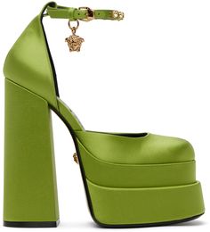 Satin heels in green. · Square toe · Signature Medusa charm and crystals at pin-buckle ankle strap · Logo-embossed goatskin footbed · Covered block heel with rubber injection · Covered platform midsole · Medusa hardware at polished calfskin outsole · Platform: H2.5 in · Heel: H6 in Supplier color: Acid lime Medusa Aevitas Platform, Lime Green Heels, Lime Green Shoes, Versace Heels, Green Platform, Heels Aesthetic, Funky Shoes, Fun Heels