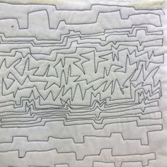 a piece of white paper that has been made into a maze with black and white writing on it