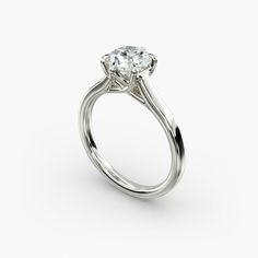 a diamond engagement ring on a white background