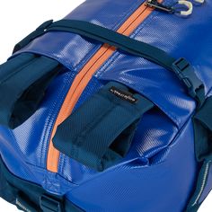 a blue duffel bag with an orange zipper