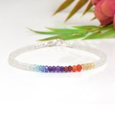 Ombre Rainbow Gemstone Bracelet with Moonstone in Sterling Silver This bracelet is very dainty - beads measure about 3-4mm apiece AAA Quality Please Feel Free To Contact If You Have Any Query. Orders are shipped within 1 business working day, excluding orders made on Sunday or national holidays. Domestic delivery takes 5-7 business days. International delivery takes 11-23 business days. PAYMENT METHOD : PayPal only Please send all payments within 7 days . Return policy: We are very confident on Pyrite Bracelet, Balance Bracelet, Bracelet Chakra, Rainbow Gemstones, Crystal Healing Bracelets, Chakra Jewelry, 7 Chakra, National Holidays, Chakra Bracelet