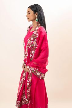 Fuchsia kurta with floral bloom embroidery. Paired with a pant and dupatta.
Components: 3
Pattern: Hand Embroidery
Type Of Work: Floral, Thread
Neckline: Round Neck
Sleeve Type: Three Quarter Sleeves
Fabric: Kurta: Modal Satin, Pant: Modal satin, Dupatta: Silk organza
Color: Pink
Other Details: 
Floral embroidered border on dupatta
Closure: Elastic
Occasion: Puja - Aza Fashions Satin Dupatta, Bloom Embroidery, Satin Pant, Pink Kurta, Satin Hands, Embroidered Border, Embroidery Floral, Kurta With Pants, Silk Organza