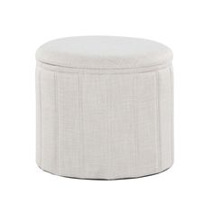 a round ottoman with a white cover