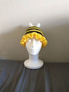 Hiiii this is a cute little bee hat! My sizing is for an average head, but of you need it smaller or bigger, just message me! Bee Headband Grasshopee, Cute Crochet Hat With Curved Brim, Fun Adjustable Beanie Bonnet, Cute Adjustable Brimmed Crochet Hat, Adjustable Fun Beanie Bonnet, Cute Adjustable Winter Bucket Hat, Adjustable Casual Beanie Costume Hats, Cute One Size Beanie Bonnet, Cute One Size Fits Most Brimmed Crochet Hat