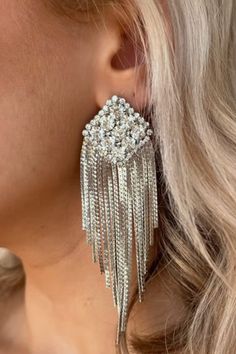 Our Sophia Diamond Tassel Drop Earrings are a perfect addition to elevate any outfit. Wear them for a night out, special occasion or event, Holiday party, wedding, Formal and more! Featuring gold plated stainless steel, a diamond top with cz stones, fringe tassel, and push backing. 4" drop length. Sophia Diamond, Diamond Top, Tassel Drop Earrings, Wedding Formal, Tassel Fringe, Silver Drop Earrings, Cz Stone, Party Wedding, Holiday Party