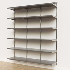 an empty shelving unit in a white room