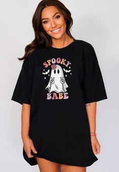 Spooky Babe Ghost Halloween Shirt, Halloween Ghost Tee, Spooky Season Outfit, Spooky Ghost Shirt, Halloween Ghost T-Shirt, Spooky Babe Tee, Halloween Party Clothing, Spooky Season Shirt, Halloween Gift for Her, Spooky Vibes Outfit, Spooky Ghost Tee, Halloween Matching Dress, Cute Ghost Shirt 👻This Spooky Babe Ghost Halloween Shirt is a perfect gift for everyone! Our shirts are made with the highest quality materials & are super soft, comfy & cozy! 👻 🟢 HOW TO ORDER 🟢 1. Check and Review ALL P Cute Halloween T-shirt For Streetwear, Cute Halloween Streetwear Tops, Cute Tops For Halloween Streetwear, Spooky Halloween Tops With Funny Print, Spooky Halloween Tops, Spooky Black Top With Character Print, Spooky Black T-shirt With Funny Print, Black Spooky T-shirt With Funny Print, Black Novelty Short Sleeve Tops