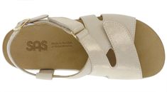 Wide leather straps gently hug the foot to add security to your step. A broad and contoured insole covered in soft microfiber supports the natural arch of the foot. An adjustable EZ Strap offers a custom fit and added comfort, while a soft sole rebounds with each step.

Heel Height: 1.125". Cream Leather Sandals With Arch Support, Cream Sandals With Arch Support And Round Toe, Ergonomic Arch Support Slip-on Sandals, Ergonomic Sandals With Ortholite Insole And Round Toe, Comfortable Ergonomic Sandals With Round Toe, Sas Shoes, Custom Made Shoes, Sandals For Sale, Comfortable Sandals