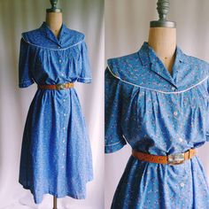 "Iconic 70s dress both in colours and style Lightweight cotton fabric suitable for summer Smocked shirtdress style that could work as a robe or light jacket Pockets in the side seams ** Hand tooled 70s belt is not included but can be found in the shop here: https://www.etsy.com/ca/listing/828864959/70s-hand-tooled-western-belt-tooled?ref=shop_home_active_29&pro=1 Label - Pia and Paula EU 38 UK 12 US 10 (shown on a size 6 mannequin) Bust - 36\" Back - 12\" (quite narrow) Sleeve - 13\" Length Spring Blue Cotton Vintage Dress, Spring Blue Vintage Cotton Dress, Spring Cotton Shirt Dress With Collared Neckline, Cotton Button-up Shirt Dress With Floral Print, Floral Print Cotton Button-up Shirt Dress, Cotton Floral Print Button-up Shirt Dress, Casual Cotton Dress With Peter Pan Collar, Blue Cotton Vintage Summer Dress, Blue Cotton Vintage Dress For Summer