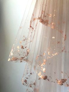 the curtain is covered with dirt and water