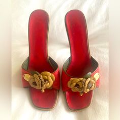 Vintage Chanel Sandals So Chic & Unique! Seldom Worn And In Great Condition! Red Canvas Band Across Foot With Leather Trim And Decoration. Open Toe Slides; 4” Wood Stacked Heel. Euro Size 39 1/2 Or Us 9 1/2. Elegant Red Slip-on Sandals, Red Slip-on Sandals For Evening, Summer Cocktail Heels With Red Sole, Red Almond Toe Sandals For Summer, Red Heels With Wooden Heel For Party, Party Red Heels With Wooden Heel, Red Party Heels With Wooden Heel, Red Heels With Wooden Heel For Summer, Party Sandals With Wooden Heel And Almond Toe