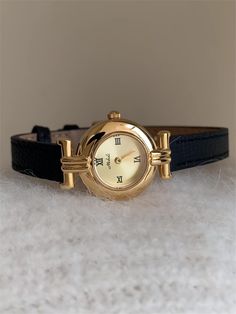 Welcome to AffordLuxe Watches! We're delighted to have you here in our store 🤩 Elevate your timeless style with this vintage-inspired women's watch featuring a classic gold-tone case and elegant Roman numeral dial. The round, golden face adds a touch of sophistication, while the sturdy black leather strap provides a chic and comfortable fit. Perfect for both everyday wear and special occasions. ★Material: - Stainless Steel  - Genuine Leather - Glass ★Dimensions: - Case Height: 8mm - Case Width: 21mm - Case Length: 21mm ★Delivery:   To ensure a smooth and successful shopping experience, please provide us with your exact shipping address and phone number. This will help us deliver your order promptly and stay in touch with you regarding any updates. ★Care Instructions: - Avoid wearing the w Chic Watches Women, Unique Watches, Elegant Watch, Vintage Watches Women, Toned Women, Watch Gift, Oval Face, Watch Fashion, Watches For Women