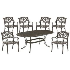 an outdoor dining table and chairs set with wrought iron frame, including one chair and four tables