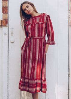 Bohemian ruffle style dress makes this so ideal with side pockets. Flowy ruffle sleeves give this dress flow and easy comfort. Perfect midi length can be worn all year long! Available in XS/S and M/L sizing. Model is wearing a XS/S, she is a size 4. Size Offered: S/M & M/L 100% Rayon (soft hand feel) Machine wash cold; hang dry to prevent from wrinkling. Dry Clean Recommended. Designed & Made in Los Angeles Saffron Seeds, Seed Of Life, Ruffles Fashion, Yoga Clothing, Ruffle Sleeves, Soft Hand, Yoga Clothes, Style Dress, Midi Length