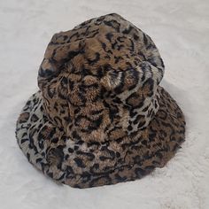 New. Adjustable. 100 % Polyester Brown Bucket Hat For Fall, Brown Bucket Hat For Fall, One Size Fits Most, Adjustable Brown Hats With Faux Fur Lining, Brown Bucket Hat For Winter, One Size, Brown Winter Bucket Hat, One Size, Brown Winter Bucket Hat One Size, Brown Winter Bucket Hat In One Size, Trendy Brimmed Hat With Faux Fur Lining, Trendy Brown Hat One Size