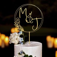 a wedding cake with the initials mr and mrs on it