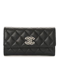 This is an authentic CHANEL Caviar Quilted Crystal CC Large Gusset Flap Wallet in Black. This chic clutch wallet is crafted of diamond quilted luxurious caviar leather in black. The wallet features a front flap with a gold chain and crystal encrusted Chanel CC logo. This opens with a snap to a partitioned black leather and fabric interior with a card slot panel, patch pockets, and a coin pocket. Chanel Wallet, Chanel Caviar, Diamond Quilt, Cc Logo, Clutch Wallet, Card Sizes, Gold Chain, Patch Pocket, Gold Chains