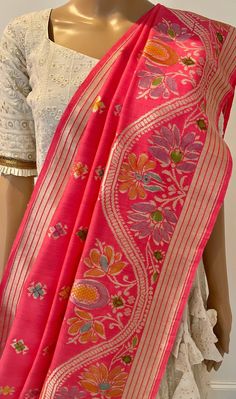 This pinkish orange color Banarasi Duptatta with zari floral design goes well with any simple dress or white dress or white lehenga or any light color lehenga. It can also be used in mix and match with any traditional Langa/Blouse as Voni This dupatta/chunni can be used with any Indian dress or Lehenga or as scarf or stole Which fabric goes with banarasi dupatta? That's the great part about Banarasi silk--even when paired with fabrics like velvet or Chanderi, it'll make the whole outfit look well put-together. What is the origin of Banarasi dupatta? Banarasi Dupatta The Origins and History of Banarasi Dupattas The place of origin of this apparel is in its name - Varanasi, Uttar Pradesh. This Beautiful elegant georgette dupatta can be used for weddings or Baby shower, Bridal shower, Birthda Light Color Lehenga, Plain Lehenga, Langa Blouse, Designer Dupatta, Langa Voni, White Lehenga, Pinkish Orange, Georgette Dupatta, Stole Scarf