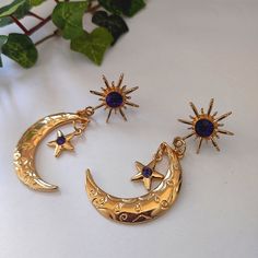 Pretty Gold Tone With Purple Crystal Accents Star With Patterned Crescent Moon And Star Earrings Post Style 2.5" In Length New #29 Boho Bohemian Celestial Lunar Gypsy Hippie Festival Star Whimsigoth Gifts, Gold Celestial Crystal Dangle Earrings, Whimsical Gold Earrings With Moon Charm, Mystical Gold Earrings With Sun And Moon Design, Celestial Gold Plated Moon Earrings, Gold Moon-shaped Celestial Crystal Earrings, Otherworldly Beauty, Star Drop Earrings, Crescent Moon And Star