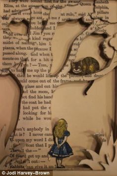 an altered photograph of a girl and cat in a book page with torn paper on it