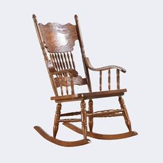 a wooden rocking chair on a white background