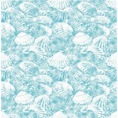 a blue and white wallpaper with seashells on it