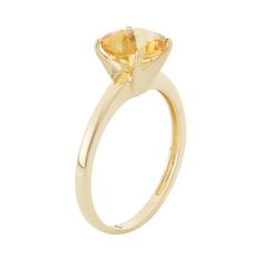 Add stunning sparkle to your ensemble with this 10k gold citrine ring. Click on this JEWELRY & WATCHES GUIDE to learn about fit, styles, materials and more!RING DETAILS Width: 8 mm Metal: 10k gold STONE DETAILS Stone type: genuine citrine Cut: round Setting: prong  Size: 5. Color: Orange. Gender: female. Age Group: adult. Classic Yellow Gold Ring With Yellow Sapphire, Classic Yellow Gold Yellow Sapphire Ring, Classic Yellow Sapphire Yellow Gold Ring, Timeless Yellow Gold Topaz Ring With Accent Stones, Classic Yellow Sapphire Round Rings, Classic Yellow Sapphire Ring For Formal Occasions, Formal Citrine Solitaire Birthstone Ring, Anniversary Citrine Birthstone Ring In Yellow Gold, Formal Solitaire Citrine Jewelry