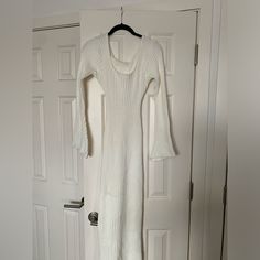 Perfect For Transitioning Seasons. White Fitted Long Sweater Dress, Long Fitted White Sweater Dress, White Ribbed Stretch Sweater Dress, White Ribbed Midi Length Sweater Dress, White Ribbed Midi-length Sweater Dress, White Fitted Sweater Dress For Spring, White Ribbed Knit Dress, White Ribbed Midi Dress For Winter, White Ribbed Long Sleeve Midi Dress