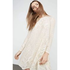 Our must-have long-sleeve dress in geometric lace falls for a semi-relaxed fit and has some stretch for all-day ease. Its semi-sheer effect is pared down with its jersey lining through the body.PulloverGeometric patchwork laceFabric: 95% nylon, 5% spandex lace; lining: 92% polyester, 8% spandex jerseyWashable, dry clean recommendedMid-weight, stretch fabricKnee-length hemlineTrue to fitModel is approximately 5'9” Spring Crochet Dress With Long Lace Sleeves, Long Sleeve Sheer Mini Dress For Fall, Spring Long Sleeve Lace Crochet Dress, Spring Long Sleeve Crochet Lace Dress, Chic Long-sleeved Lace Crochet Dress, Chic Long Sleeve Lace Dress For Spring, Chic Long Sleeve Lace Crochet Dress, Chic Long Sleeve Crochet Lace Dress, White Long Sleeve Sheer Lace Dress